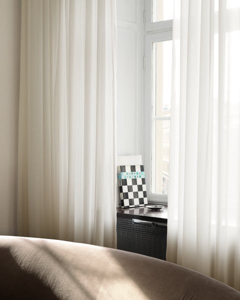 Sheer curtains with subtle linen texture