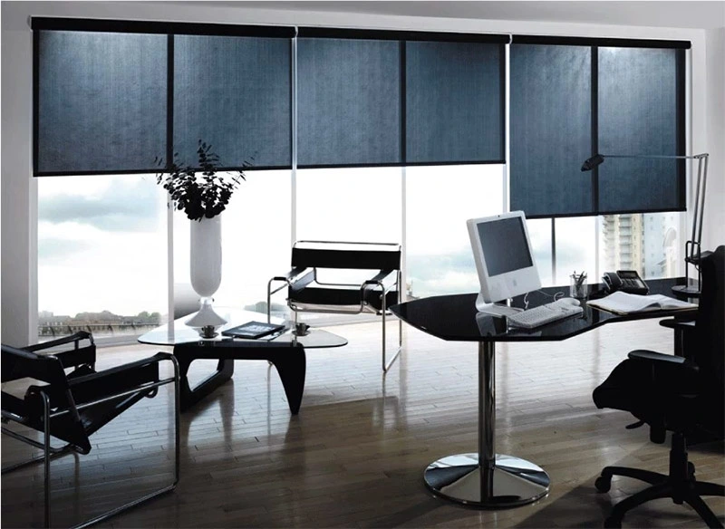 Office workspace with window blinds in background