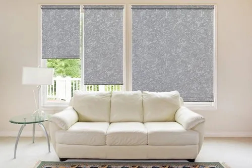 Roller blinds covering a large window